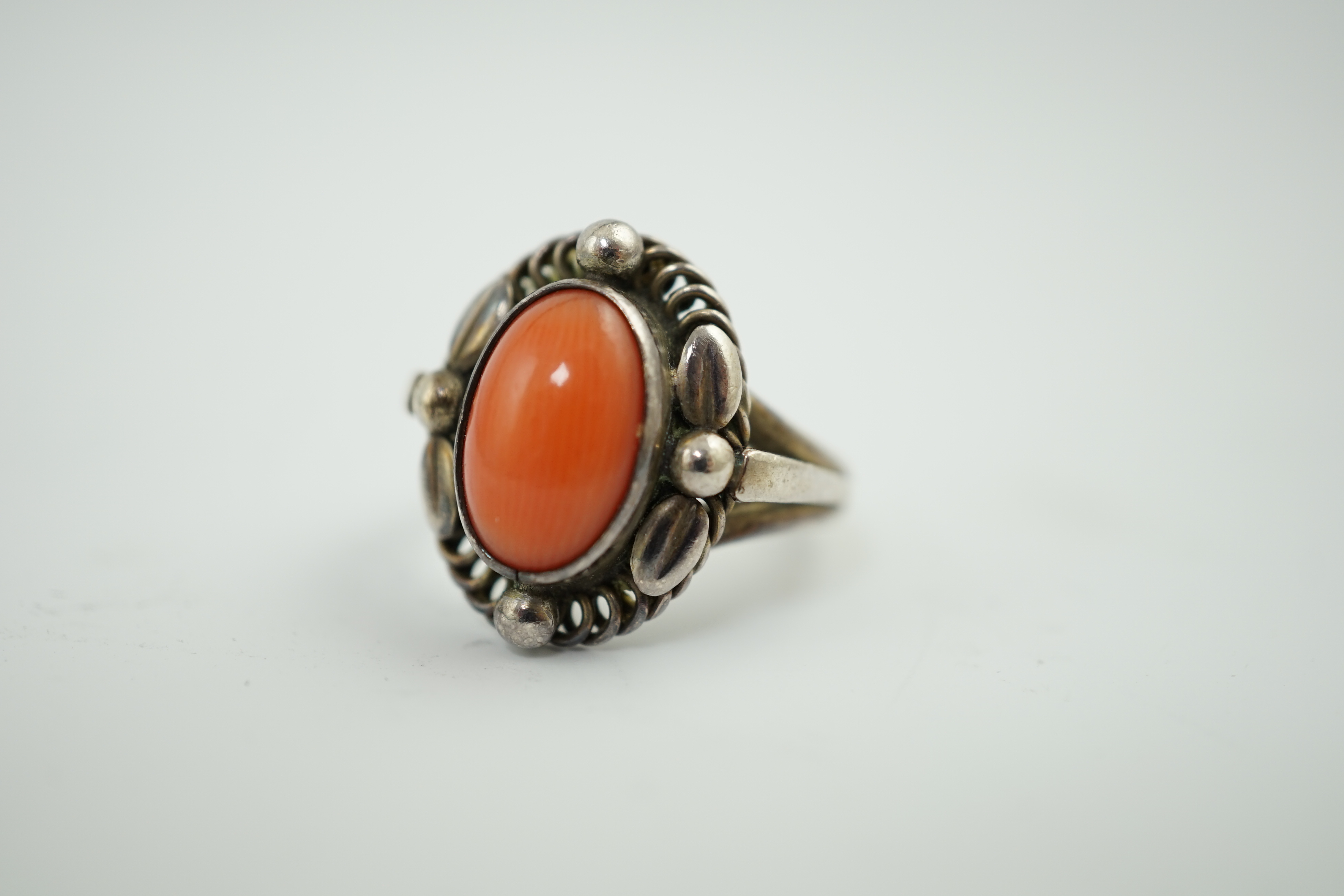 A Georg Jensen sterling silver and cabochon coral set ring